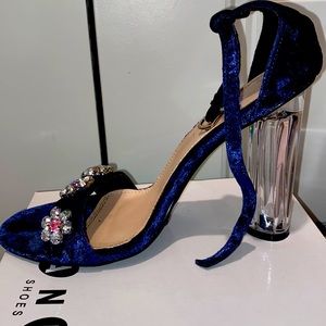 Blue suede heels with embellishments